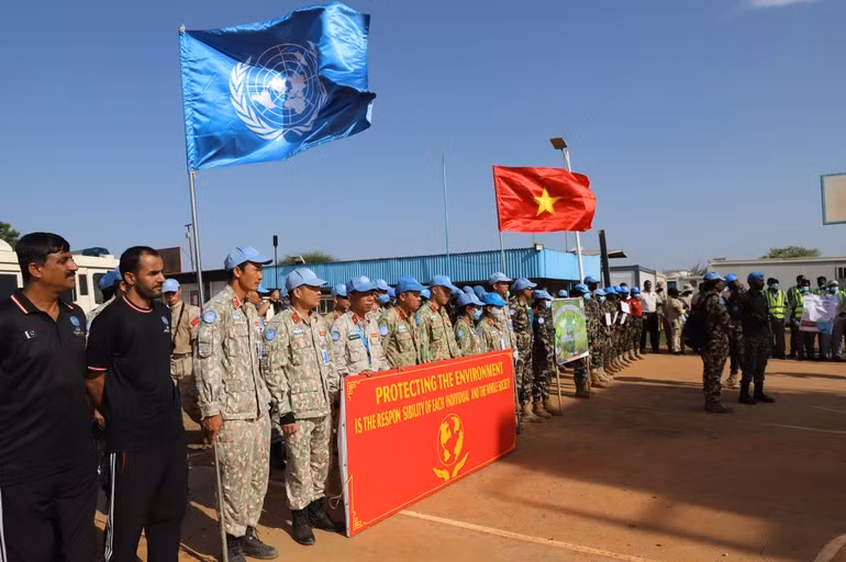 Vietnamese “blue beret” soldiers march with UNISFA colleagues for the environment.