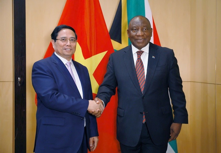 Vietnamese Prime Minister Pham Minh Chinh (L) and South African President Cyril Ramaphosa at their meeting on November 21. (Photo: VGP)