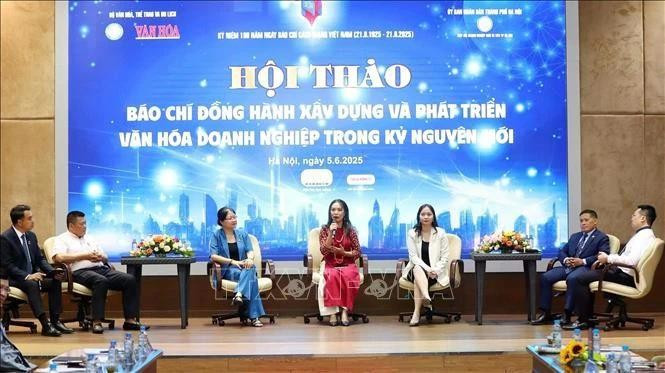 At the seminar on the press’s role in the building of corporate culture in the new era, held in Ha Hoi on June 5. (Photo: VNA) 