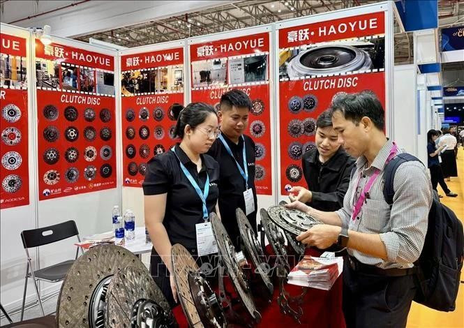 Buyers seek suppliers of globally standardised equipment at Automechanika, opened in Ho Chi Minh City on June 19. (Photo: VNA)