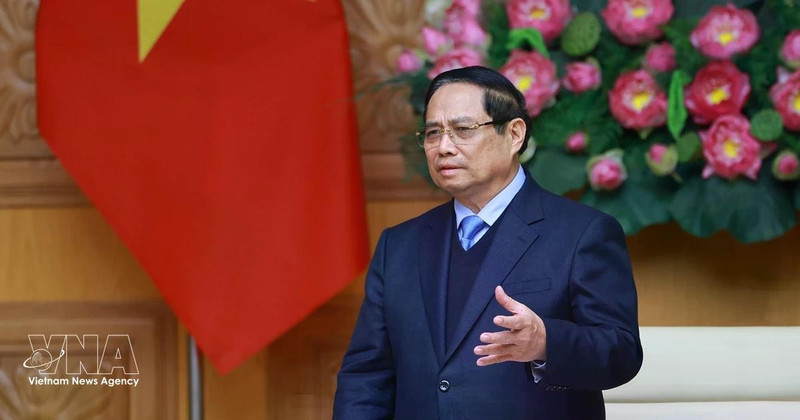 Prime Minister Pham Minh Chinh speaks at a meeting with a delegation of leaders from 37 member companies of the Japan Chamber of Commerce and Industry. (Photo: VNA)
