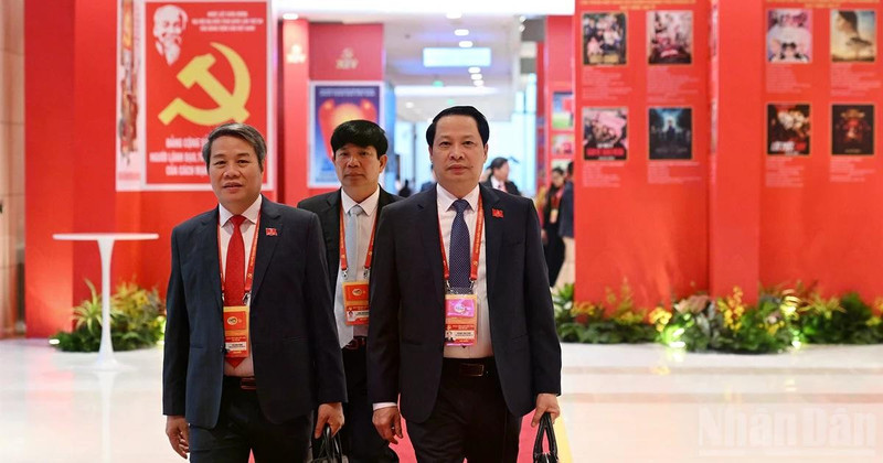Delegates arrive for the opening session of the 14th National Congress of the Communist Party of Viet Nam. (Photo: TRAN HAI)