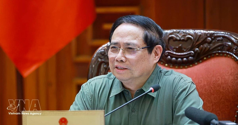 Prime Minister Pham Minh Chinh speaks at the meeting between standing Government members and representatives of ministries, agencies and Phu Tho province (Photo: VNA)