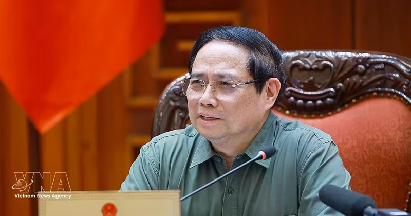Prime Minister Pham Minh Chinh speaks at the meeting between standing Government members and representatives of ministries, agencies and Phu Tho province (Photo: VNA)