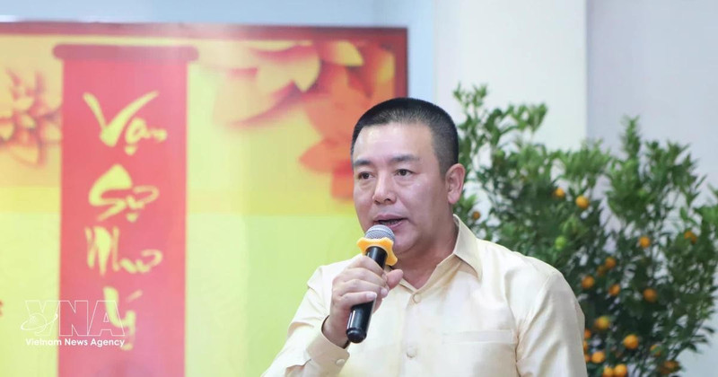 Defence Attaché of Viet Nam to Laos Colonel Phan Huu Thang speaks at the event. (Photo: VNA)