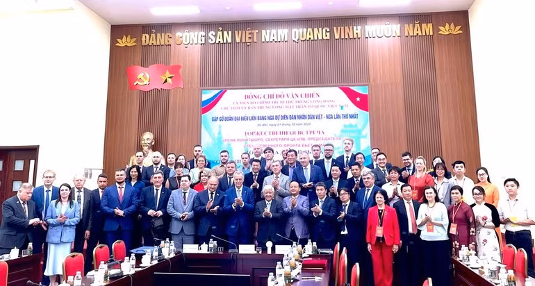 The delegates pose for a photo.