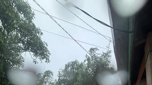 This photo taken on Nov. 25, 2025 and released by Indonesia's National Search And Rescue Agency (Basarnas) shows rescue team evacuating stranded villagers with a rubber boat as heavy rain hits North Sumatra, Indonesia. 13 people have died after floods and landslides struck seven regencies and cities in Indonesia's North Sumatra province, the Provincial Disaster Management Agency (BPBD) said Wednesday.