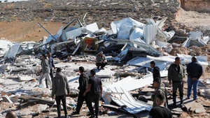 People check the rubble of commercial shops demolished by Israeli military bulldozers in south of the West Bank city of Hebron, Nov. 26, 2025. (Photo: Xinhua)
