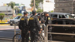 Police officers ask a pedestrian for identification near the La Cultura metro station in Lima, Peru, on Oct. 22, 2025. Peruvian President Jose Jeri declared on Tuesday a 30-day state of emergency for the capital Lima and the neighboring Callao region to tackle worsening public security. (Photo: Xinhua)