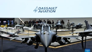 People visit the booth of Dassault Aviation during the 55th Paris Air Show at Le Bourget Airport near Paris, France, June 17, 2025. The 55th edition of the Paris Air Show officially opened on Monday and will run until June 22, with the participation of about 2,400 exhibitors from 48 countries and regions. (Photo: Xinhua)