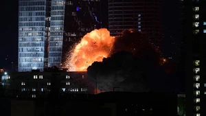 A building is hit by a missile in Tel Aviv, Israel, on June 13, 2025. Nearly 100 missiles were launched from Iran toward central and northern Israel in two massive barrages, causing significant damage and injuring 41 people, according to the Israeli military and the national emergency service, Magen David Adom (MDA). (Tomer Neuberg/JINI via Xinhua)