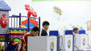 People vote at a polling station during the second phase of the general election in Yangon, Myanmar, Jan. 11, 2026. Myanmar kicked off the second phase of its multi-party democratic general election on Sunday morning, with polling stations opening across 100 townships. (Photo: Xinhua)