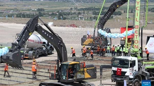 People attend a groundbreaking ceremony for a railway in Igdir, northeast Türkiye, on Aug. 22, 2025. Türkiye on Friday held a groundbreaking ceremony for a railway linking its northeastern Kars province with Azerbaijan's Nakhchivan exclave. (Mustafa Kaya/Handout via Xinhua)