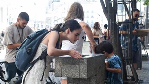 A woman drinks water from a water tap in Madrid, Spain, Aug. 4, 2025. Heatstroke alerts were issued in many places across Spain as the country is hit by a searing heatwave. (Photo: Xinhua)