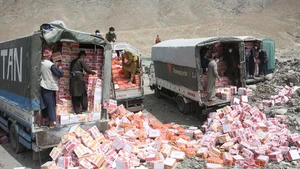 Workers unload expired and low-quality food items in Kabul, the capital of Afghanistan, July 15, 2025. Afghan authorities collected and destroyed 65 tons of expired and low-quality food items in the capital Kabul on Tuesday, officials from the Ministry of Public Health said. (Photo: Xinhua)