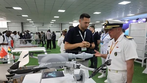 Visitors are seen during the 4th Annual International Maritime Defense Exhibition and Conference (IMDEC) in Accra, Ghana, on July 8, 2025. The IMDEC 2025, hosted under the patronage of the Ghana Navy, plays a critical role in augmenting maritime defense initiatives in the Gulf of Guinea and across the African continent. (Photo: Xinhua)