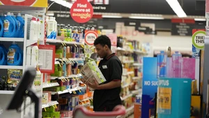 A store worker restocks shelves in Tuggeranong shopping center, in Canberra, Australia, on Sept. 18, 2025. Australia's unemployment rate remained steady at 4.2 percent in August despite a fall in full-time employment. (Photo: Xinhua)