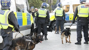 Police officers and police dogs are on duty in London, Britain, on Sept. 13, 2025. More than 100,000 protesters have joined an anti-immigration rally organized by a far-right activist on Saturday in central London. The "Unite the Kingdom" rally, organized by far-right activist Stephen Yaxley-Lennon, known as Tommy Robinson, led to substantial police presence and violent clashes in between protesters and between protesters and police. Multiple arrests were witnessed on-site. (Photo: Xinhua)