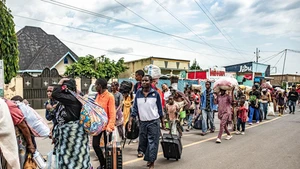 Displaced people from the Democratic Republic of the Congo (DRC) are seen in the town of Bugarama in neighboring Rwanda, on Dec. 5, 2025. The March 23 Movement (M23) rebels have expanded their operations across several areas of South Kivu Province in eastern Democratic Republic of the Congo (DRC) over the past days, even as the DRC and Rwanda signed in Washington a peace deal hailed as a major step toward de-escalation in the region. Residents in the affected areas reported a FARDC pullback and the displacement of civilians fleeing the new combat zones. Hundreds of families have arrived in Uvira, while others from Kamanyola, a strategic crossroad in the province, crossed into Rwanda to escape shellfire. (Photo: Xinhua)