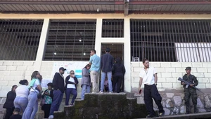 Voters line up as they wait to cast their ballots at a polling station during the general elections in Tegucigalpa, capital of Honduras, Nov. 30, 2025. Honduras on Sunday launched nationwide general elections to choose a new president and members of Congress. (Photo: Xinhua)
