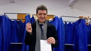 Romanian President Nicusor Dan votes during a local election at a polling station in Bucharest, Romania, on Dec. 7, 2025. Bucharest's citizens on Sunday vote in a local mayoral election after the former mayor Nicusor Dan was elected as Romanian president in May. (Photo: Xinhua)