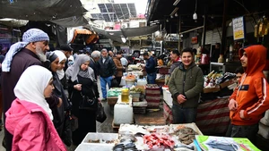 Syrians buy frozen fish at a fish market in Damascus, Syria, Feb. 23, 2026. Popular markets in Damascus have become crowded during the holy month of Ramadan, with shoppers searching for cheaper options amid economic hardship. (Photo: Xinhua)