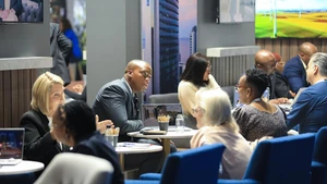 People communicate at the Meetings Africa 2026 in Johannesburg, South Africa, Feb. 24, 2026. The Meetings Africa 2026 opened at the Sandton Convention Centre in Johannesburg on Tuesday. (Photo: Xinhua)