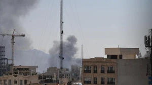 This photo taken on March 1, 2026 shows thick smoke in Tehran, Iran. Israel's military said Sunday its warplanes carried out "large-scale strikes" on the headquarters of Iran's Islamic Revolutionary Guard Corps in Tehran, and released footage showing several bombs dropped on two adjacent compounds, causing large explosions. (Photo: Xinhua)