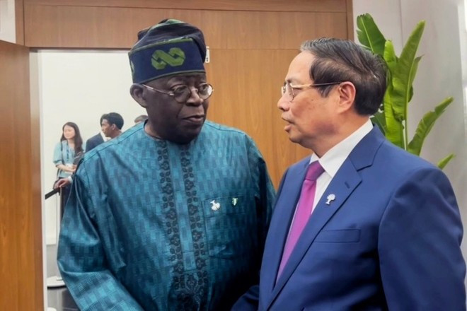 PM Pham Minh Chinh (R) and Nigerian President Bola Ahmed Tinubu (Photo: Government Portal) PM Pham Minh Chinh (R) and Nigerian President Bola Ahmed Tinubu (Photo: Government Portal)