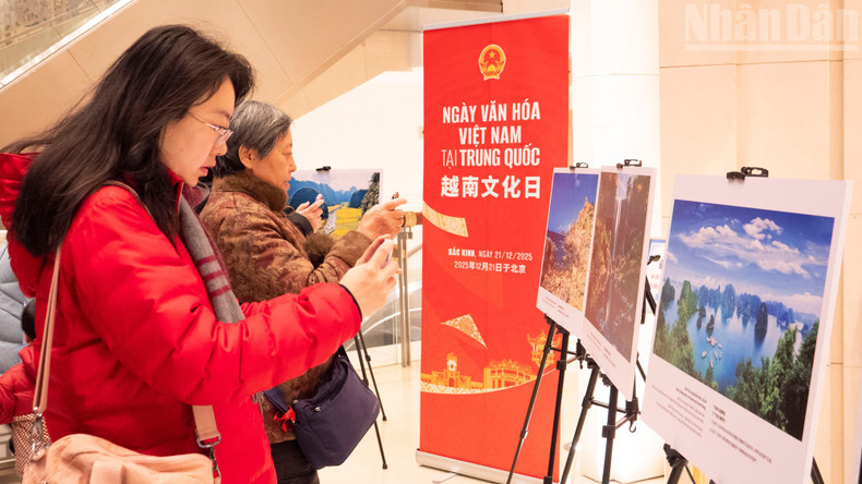 Many visitors take photos of Viet Nam’s famous landmarks.