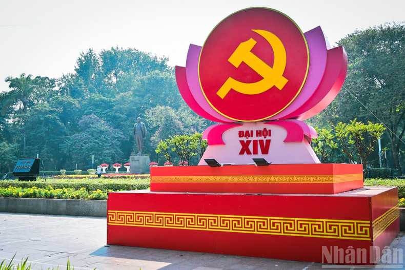 A large emblem of the 14th Party Congress stands in front of Lenin Park Square.