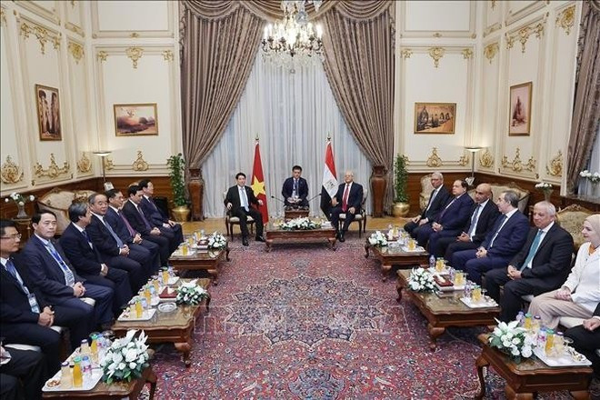 State President Luong Cuong meets with Speaker of the Egyptian House of Representatives Hanafy El Gebaly in Cairo on August 6. (Photo: VNA) State President Luong Cuong meets with Speaker of the Egyptian House of Representatives Hanafy El Gebaly in Cairo on August 6. (Photo: VNA)