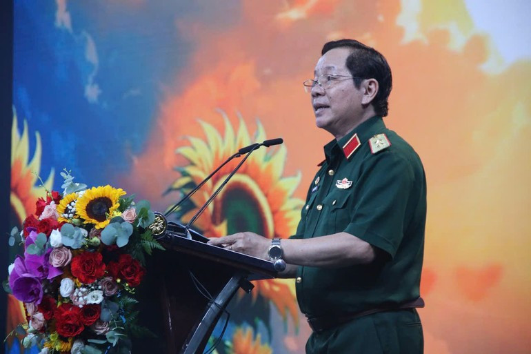 Lieutenant General Nguyen Huu Chinh, President of the Viet Nam Association for Victims of Agent Orange/dioxin, speaks at the event. (Photo: HAI LY) nhc.jpg
