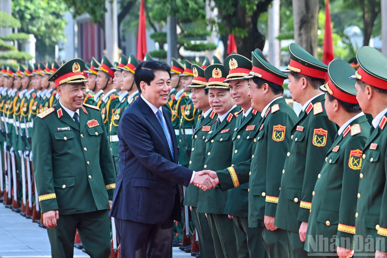 State President Luong Cuong with leaders of the National Defence Academy at the opening ceremony.