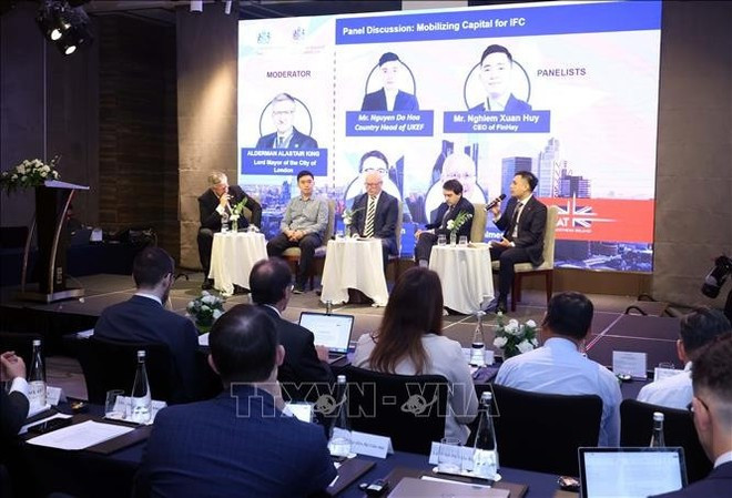 At the UK-Vietnam high-level IFC conference (Photo: VNA) nguyen-hoa-binh-2.jpg