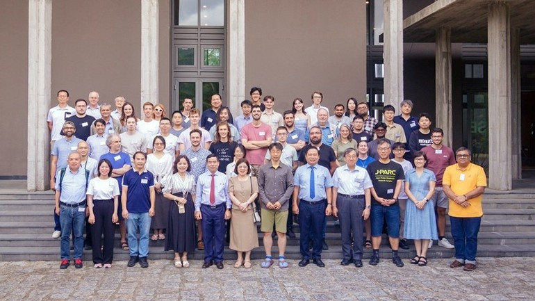 Scientists take a commemorative photo at the ICISE Centre. neutrino-physics-0045.jpg