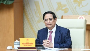 PM Pham Minh Chinh speaks at the meeting. (Photo: Tran Hai)