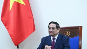 Vietnamese Prime Minister Pham Minh Chinh at the phone talks with his Algerian counterpart Sifi Ghrieb on March 18. (Photo: Tran Hai)