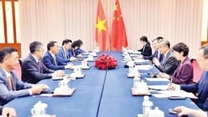 Vietnamese and Chinese officials hold talks in Yunnan, China. (Photo: Vietnamese Embassy in China)