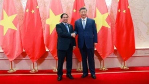 Vietnamese Prime Minister Pham Minh Chinh and General Secretary of the Communist Party of China Central Committee and President of China Xi Jinping at their meeting on August 31. (Photo: NDO)