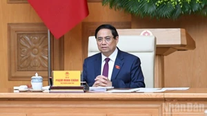 Prime Minister Pham Minh Chinh addresses the 14th meeting of the Central Council for Emulation and Commendation in Ha Noi on October 20 (Photo: Tran Hai)