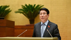 President Luong Cuong delivers a report on the State leader's performance during the 2021–2026 term at the 15th National Assembly’s 10th session on October 20. (Photo: Duy Linh)