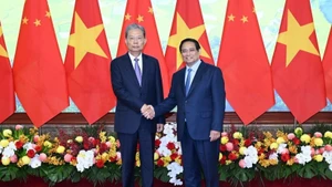 Prime Minister Pham Minh Chinh receives Zhao Leji, member of the Standing Committee of the Political Bureau of the Communist Party of China Central Committee and Chairman of the Standing Committee of the National People’s Congress of China, in Ha Noi on September 2. (Photo: NDO)