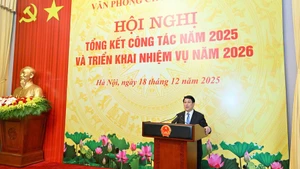 State President Luong Cuong speaks at a year-end meeting in Ha Noi on December 18 to summarise operations of the Presidential Office in 2025 and outline its tasks for 2026.