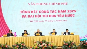 Deputy PM Nguyen Hoa Binh attends the year-end review conference of the Government Office. (Photo: VGP)