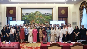 Delegates at the conference pose for a photo.