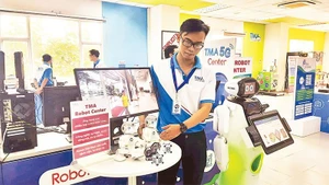 TMA Technology Group and Quang Trung Software City showcase their technology products.