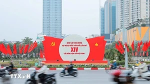 Posters and flags welcoming the 14th National Party Congress. (Photo: VNA)