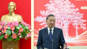 General Secretary To Lam speaks at the working session with Nhan Dan leaders. (Photo: Duy Linh)