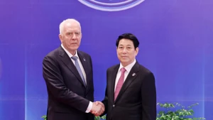 State President Luong Cuong (R) receives Russian Prosecutor General Alexander Gutsan in Ha Noi on October 25. (Photo: VNA)